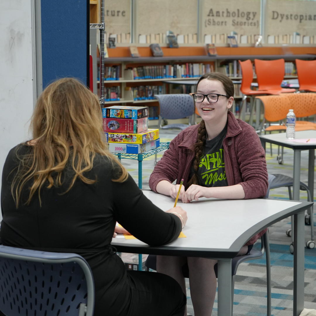 Student smiles during mock interview